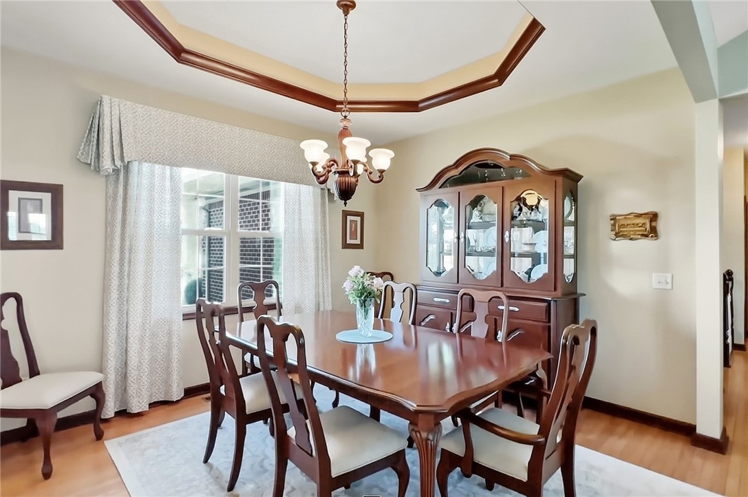 710 Governors Road Troy, OH 45373 - Photo 15 of 56 This elegant dining area features a beautiful window and tray ceiling.