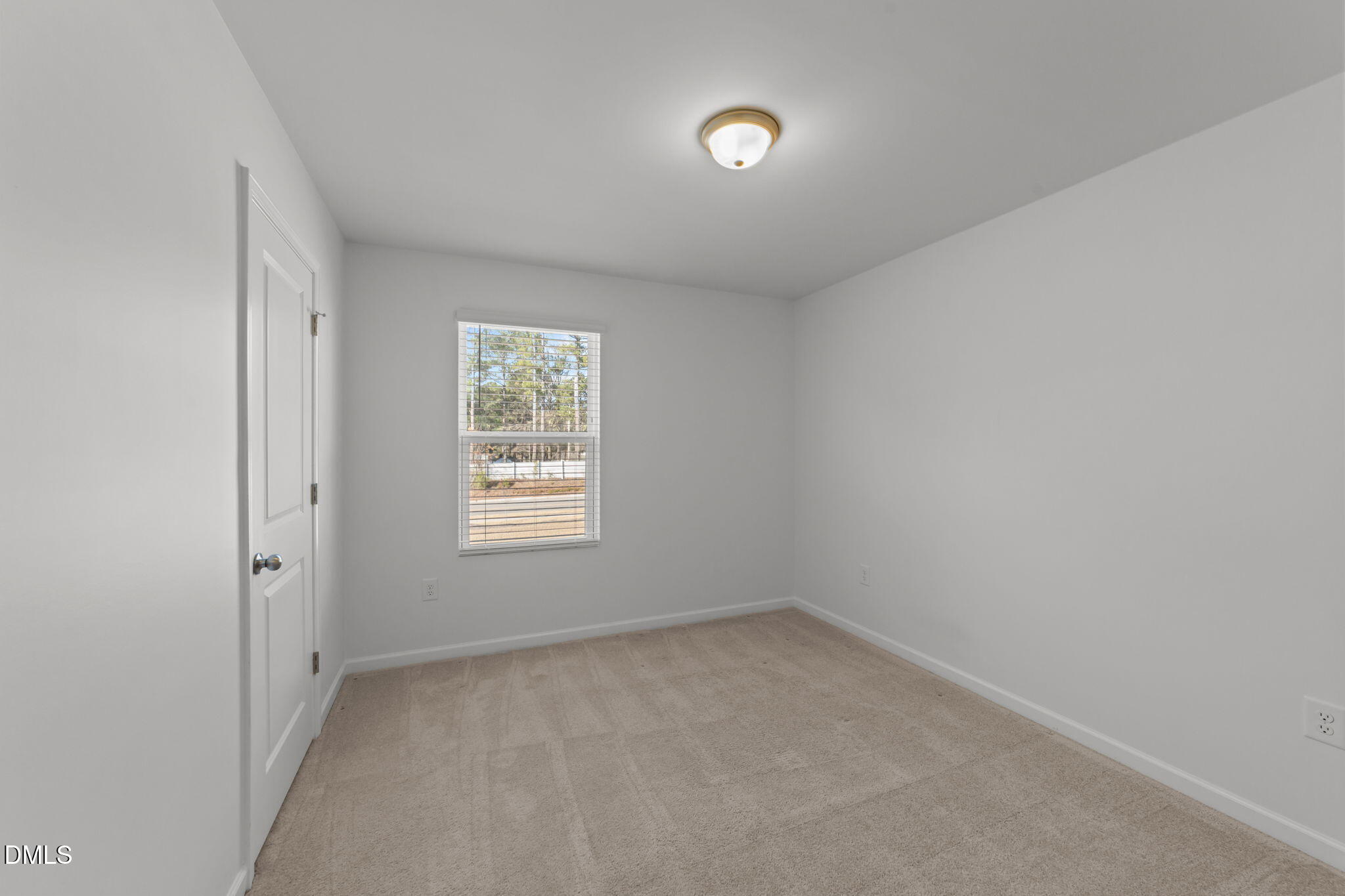 1421 Justice Union Court Raleigh, NC 27604 - Photo 18 of 21 an empty room with a window
