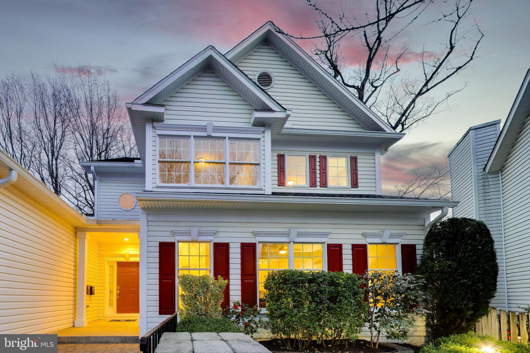 9200 Linden Grove Court Silver Spring, MD 20910 - Photo 2 of 72 a front view of a house with large windows