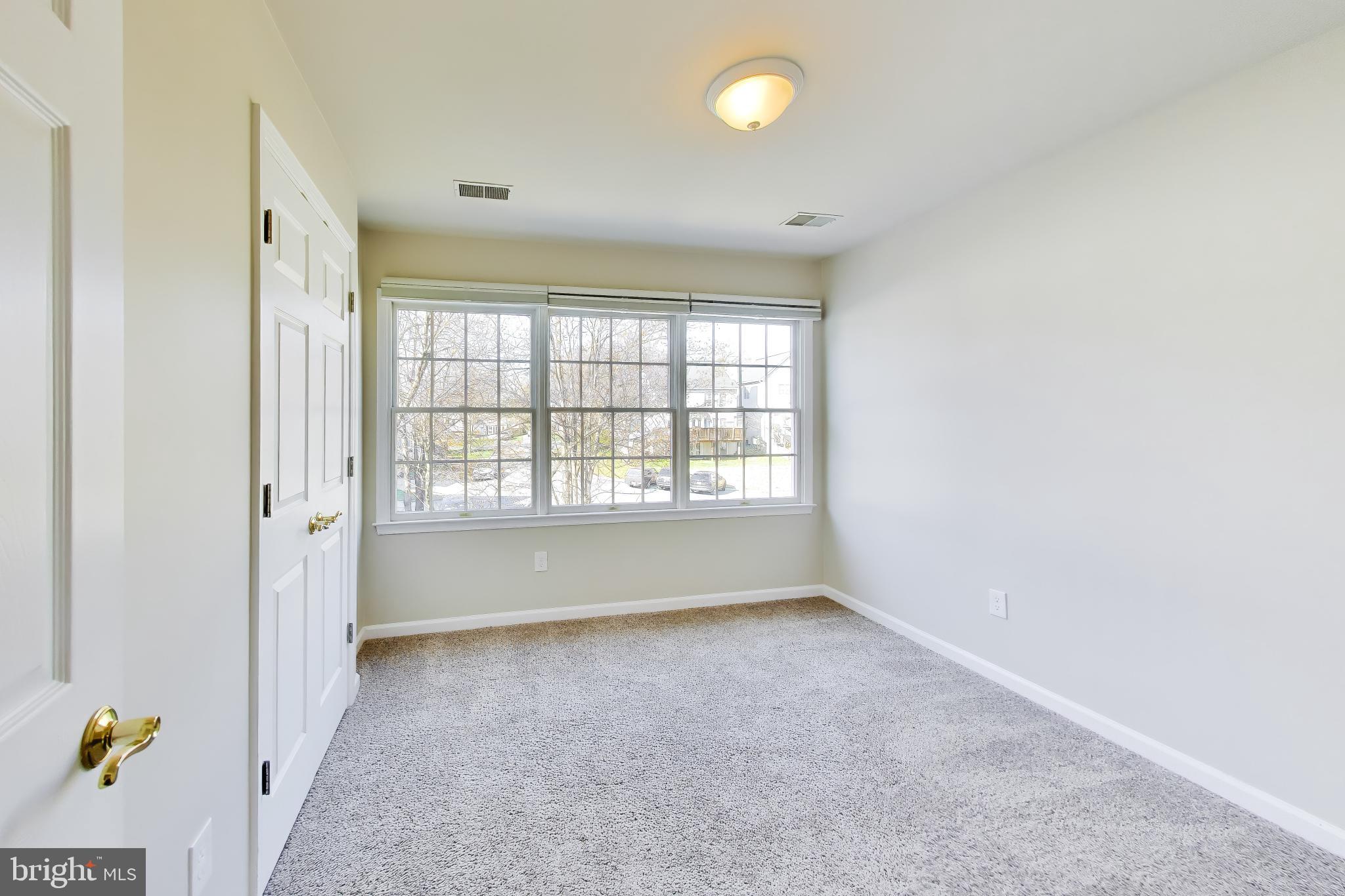 9200 Linden Grove Court Silver Spring, MD 20910 - Photo 35 of 72 an empty room with windows