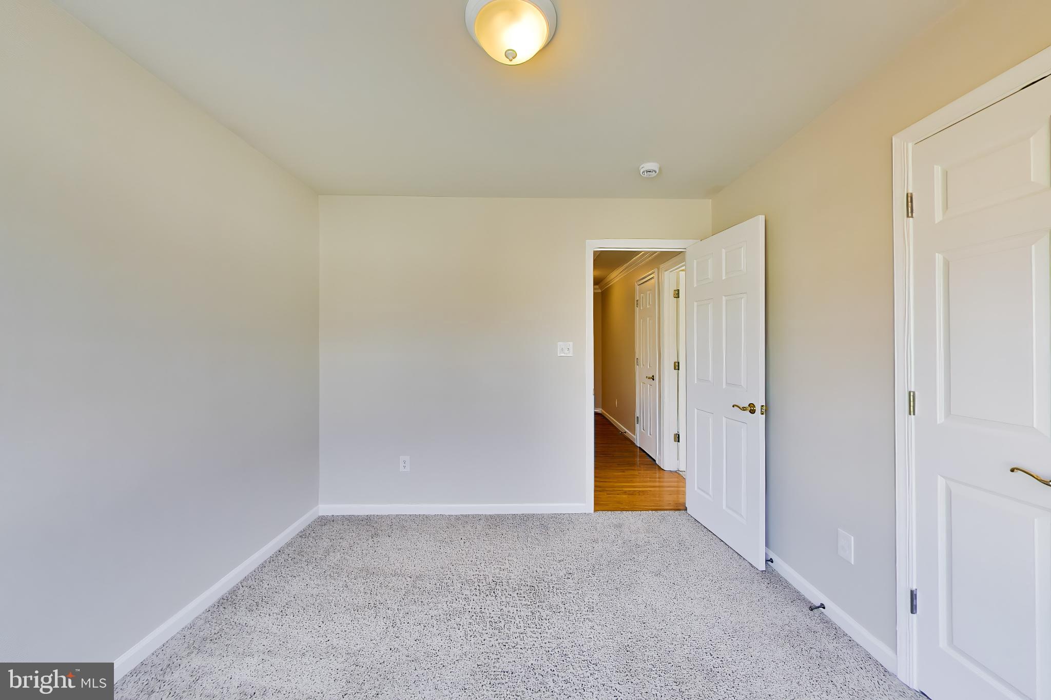 9200 Linden Grove Court Silver Spring, MD 20910 - Photo 36 of 72 a view of an empty room and window