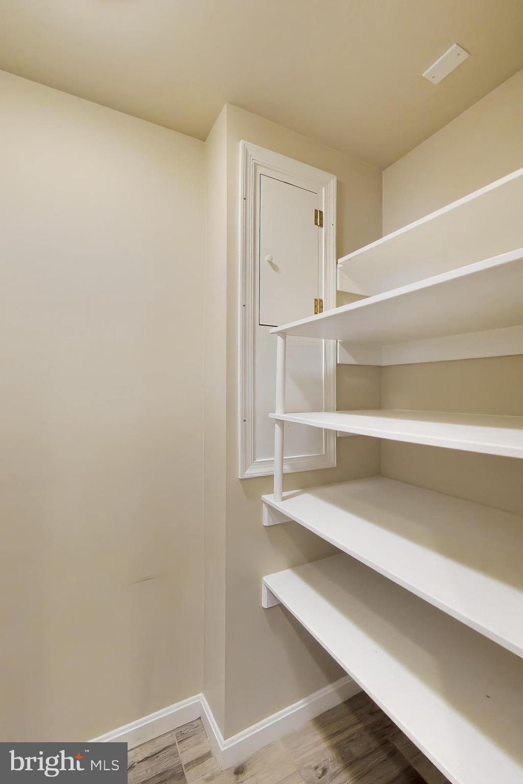 9200 Linden Grove Court Silver Spring, MD 20910 - Photo 47 of 72 a view of walk in closet with empty racks