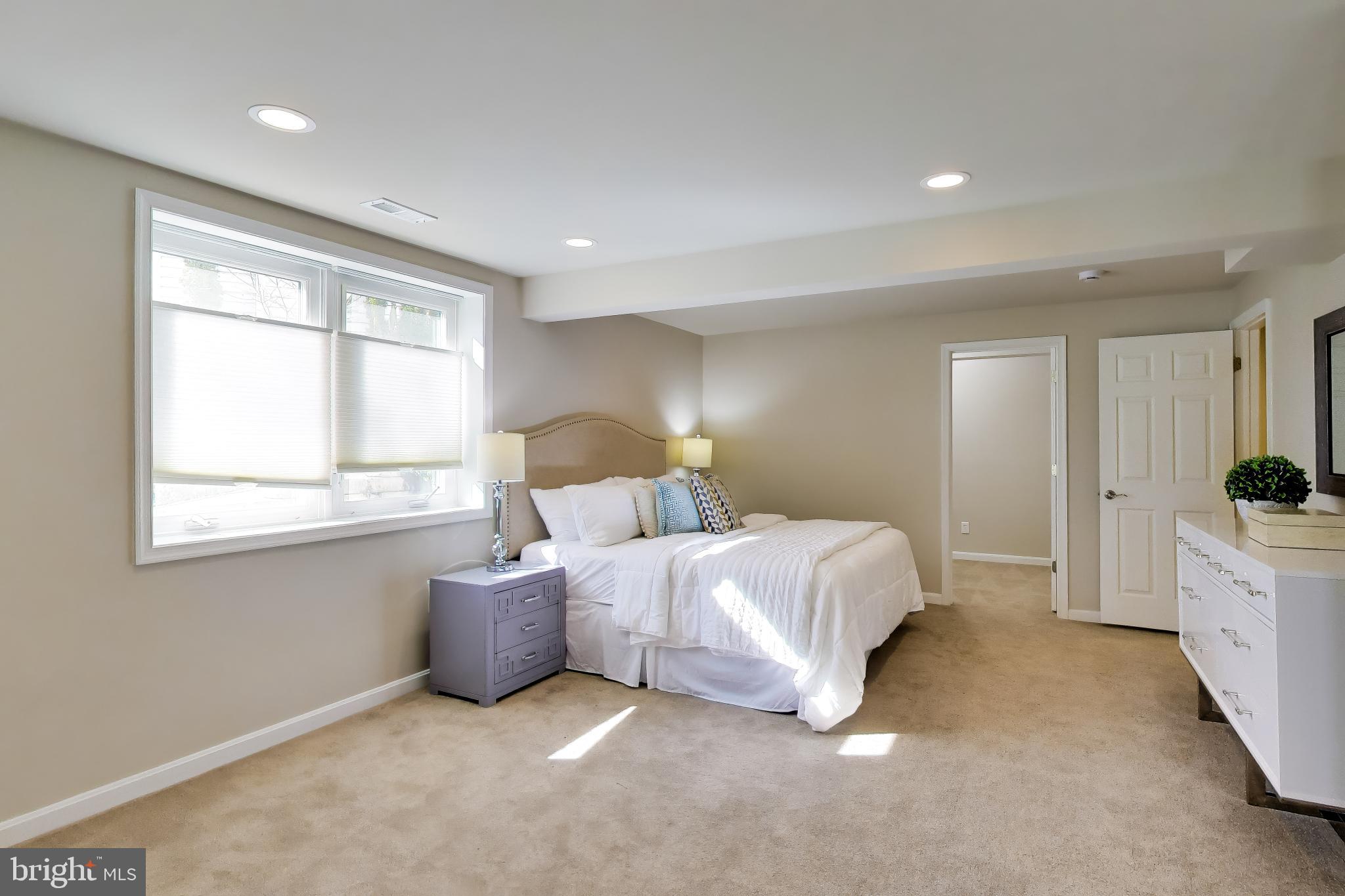 9200 Linden Grove Court Silver Spring, MD 20910 - Photo 49 of 72 a bed room with a bed and a window