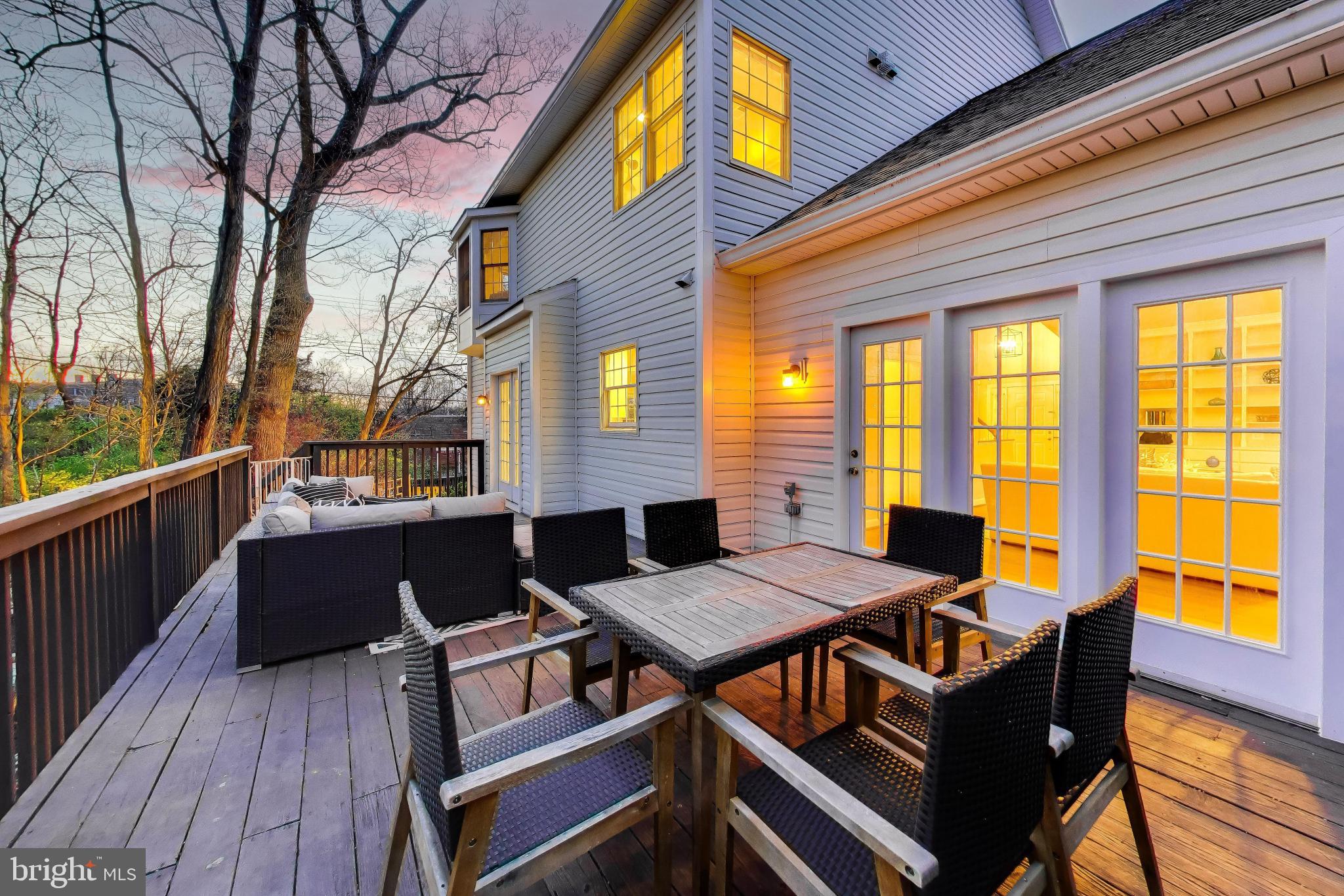 9200 Linden Grove Court Silver Spring, MD 20910 - Photo 54 of 72 a view of a patio with a table and chairs