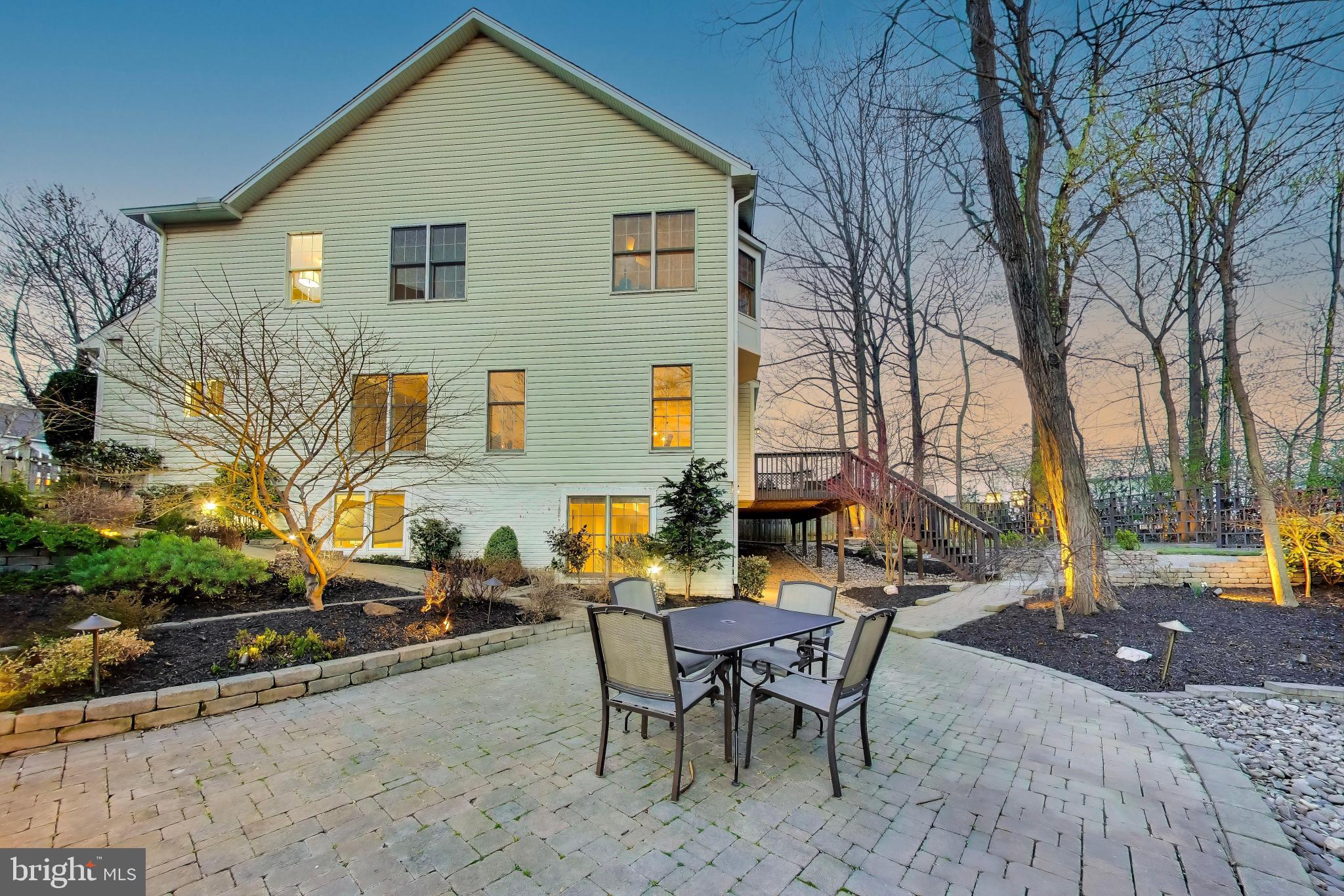 9200 Linden Grove Court Silver Spring, MD 20910 - Photo 58 of 72 a backyard of a house with table and chairs