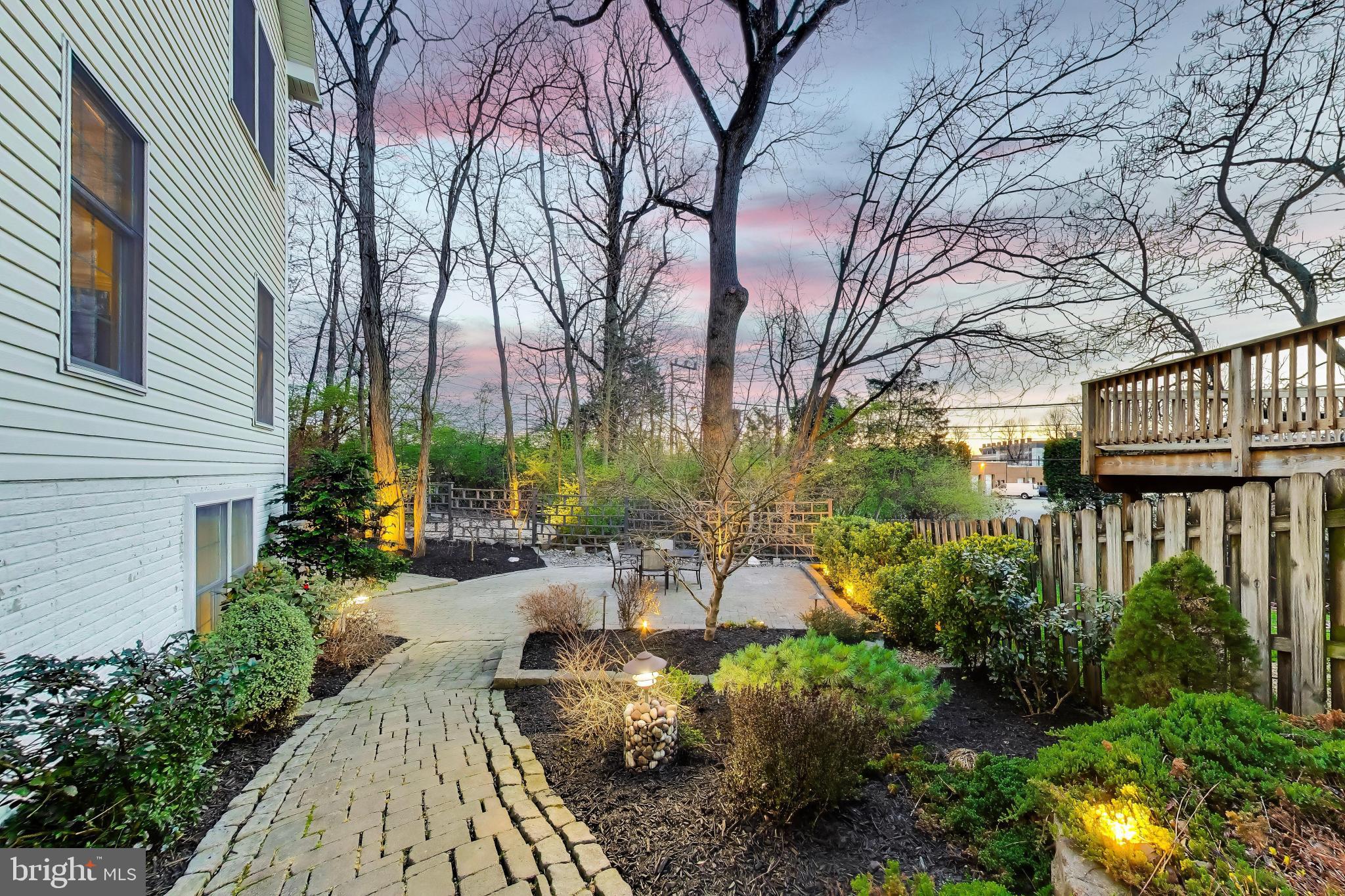 9200 Linden Grove Court Silver Spring, MD 20910 - Photo 60 of 72 a view of a yard with plants and large trees
