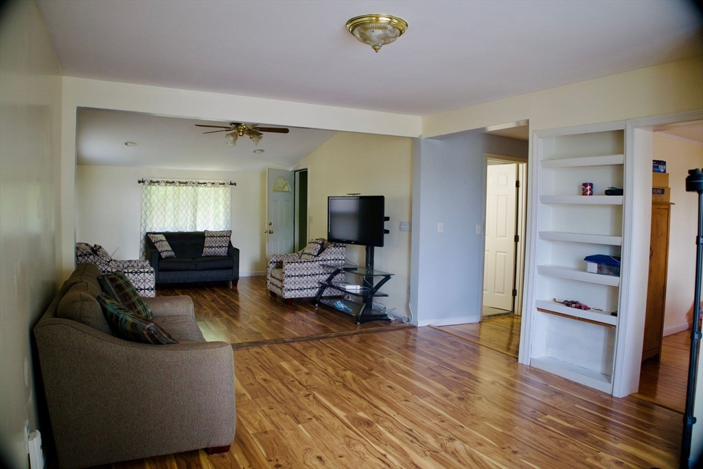 96 Harris Street Methuen, MA 01844 - Photo 12 of 19 a living room with furniture and a flat screen tv