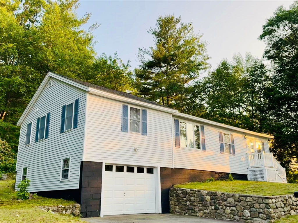 96 Harris Street Methuen, MA 01844 - Photo 2 of 19 a view of a house with a yard
