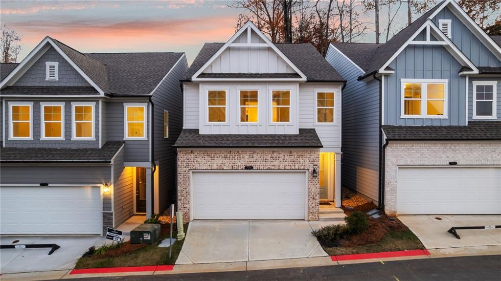 a front view of a house with yard