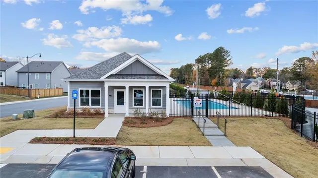 a front view of a house with a porch