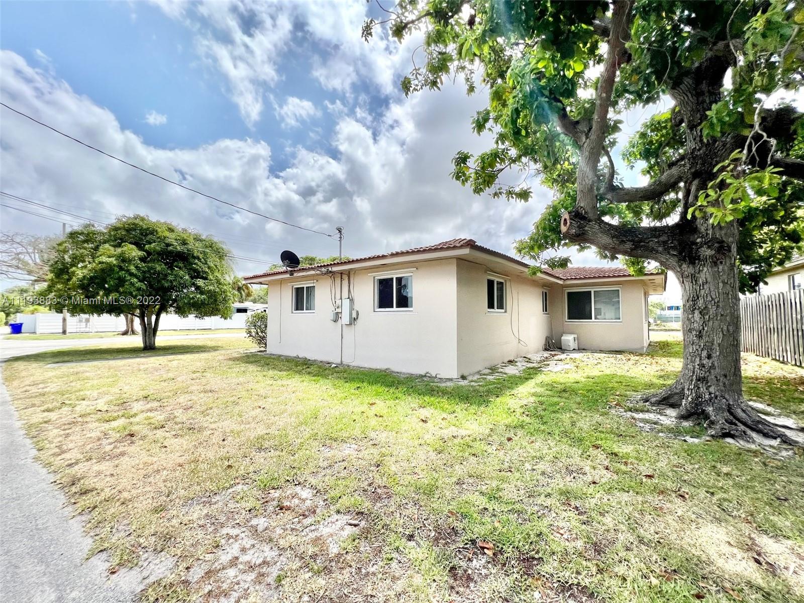 4407 Arthur Street Hollywood, FL 33021 - Photo 25 of 25 a view of a house with a yard