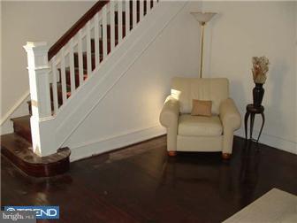 1806 44th Street Pennsauken, NJ 08110 - Photo 4 of 12 a living room with furniture and stairs