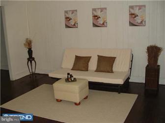 1806 44th Street Pennsauken, NJ 08110 - Photo 5 of 12 a living room with furniture and wooden floor