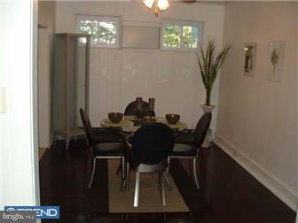 1806 44th Street Pennsauken, NJ 08110 - Photo 7 of 12 a view of a dining room with furniture and chandelier