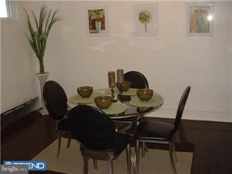 1806 44th Street Pennsauken, NJ 08110 - Photo 8 of 12 a dining room with furniture and wooden floor