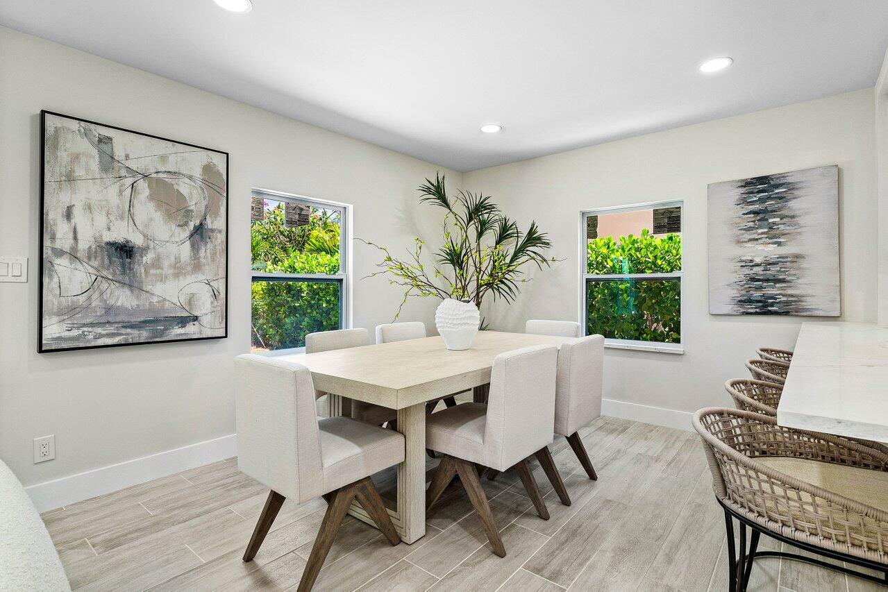 5497 North Ocean Boulevard Ocean Ridge, FL 33435 - Photo 14 of 33 a view of a dining room with furniture window and outside view