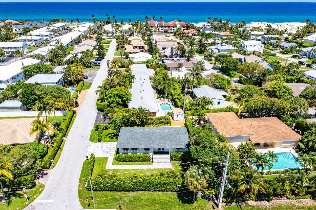 5497 North Ocean Boulevard Ocean Ridge, FL 33435 - Photo 31 of 33 an aerial view of a house with a yard