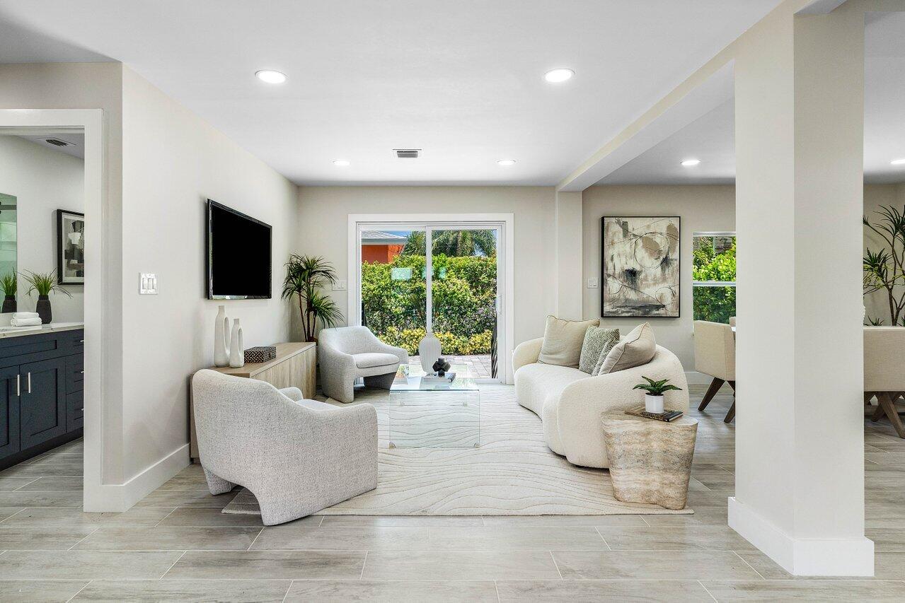 5497 North Ocean Boulevard Ocean Ridge, FL 33435 - Photo 4 of 33 a living room with furniture and a flat screen tv