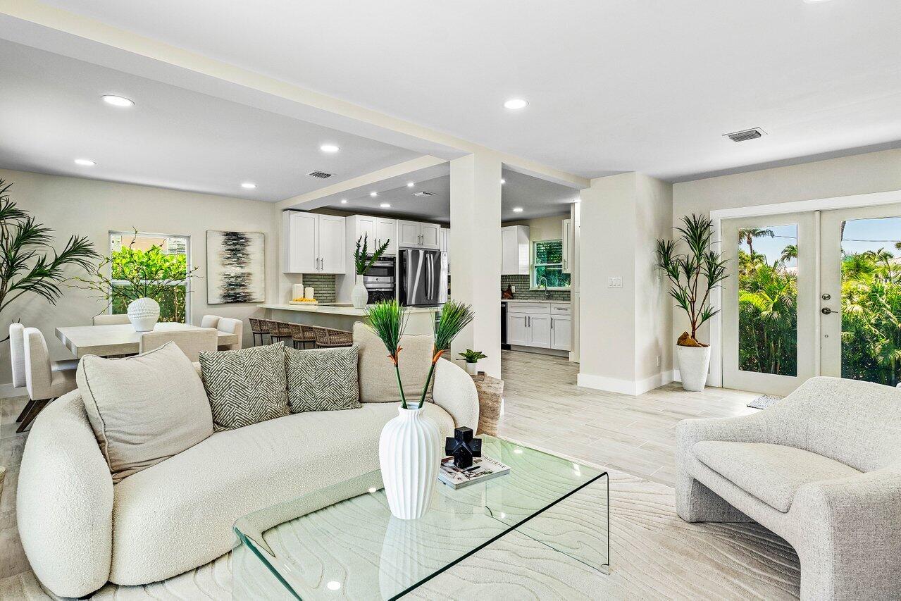 5497 North Ocean Boulevard Ocean Ridge, FL 33435 - Photo 7 of 33 a living room with furniture and a large window