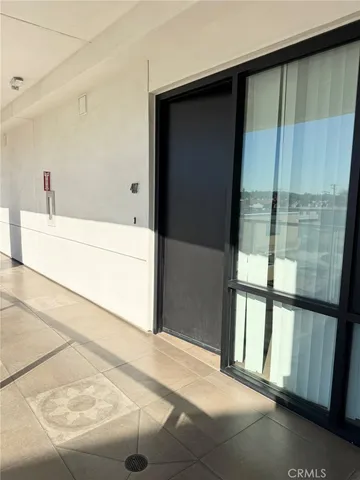 a view of a black door of a house