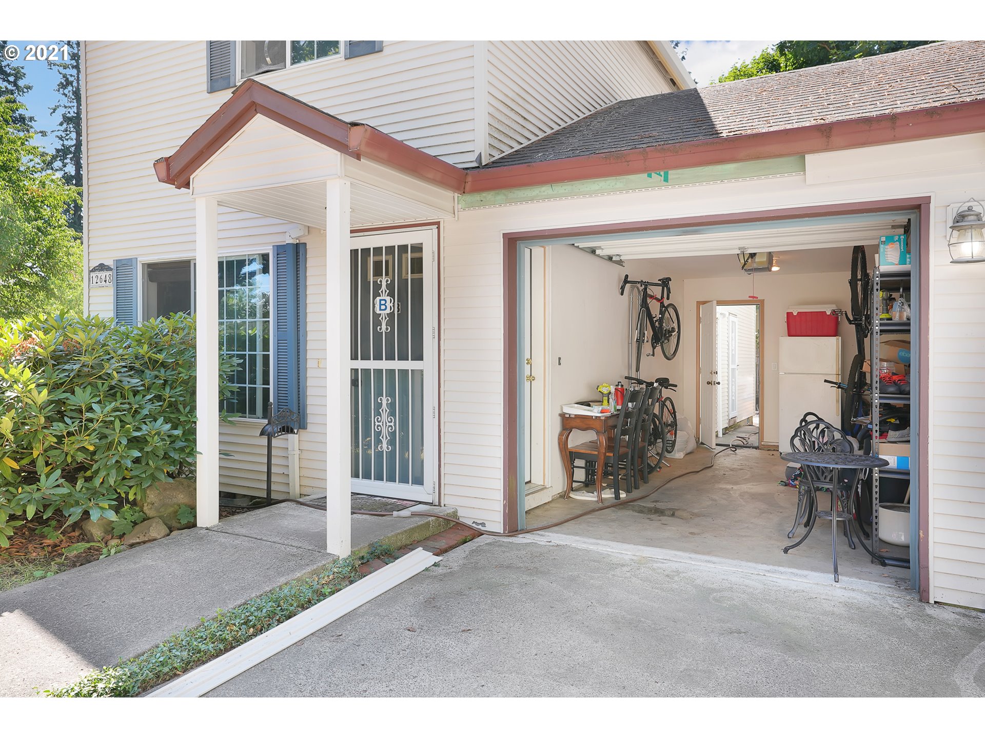 12648 Southeast Foster Road, Unit 10B Portland, OR 97236 - Photo 22 of 22 a view of a house with porch