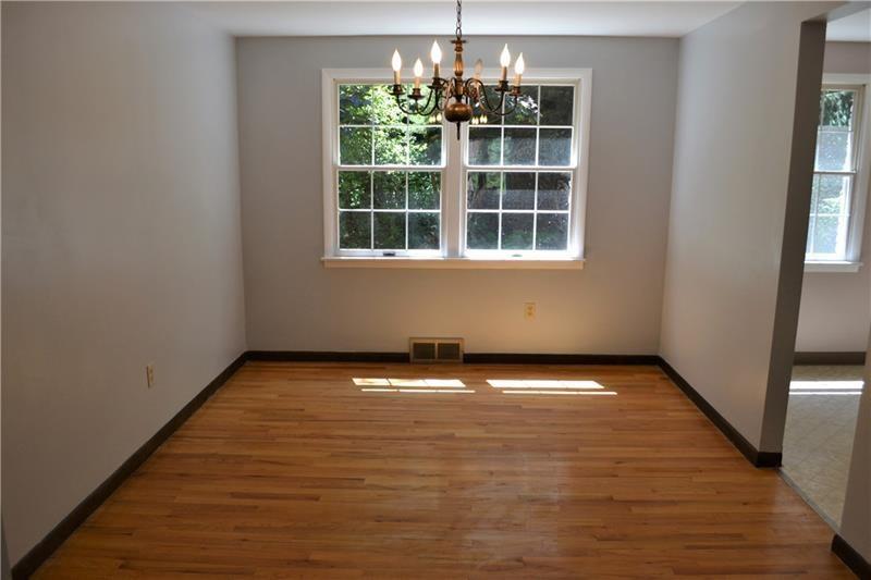 2108 Beulah Road Pittsburgh, PA 15235 - Photo 12 of 25 DINING ROOM: The dining room joins the living room and kitchen and makes entertaining easy and enjoyable...