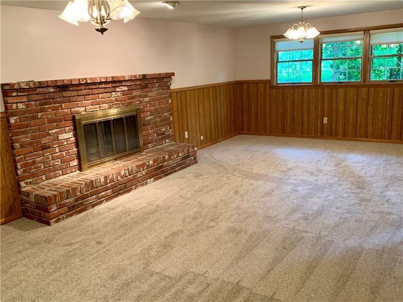 2108 Beulah Road Pittsburgh, PA 15235 - Photo 5 of 25 This awesome, updated family room features a working gas fireplace!