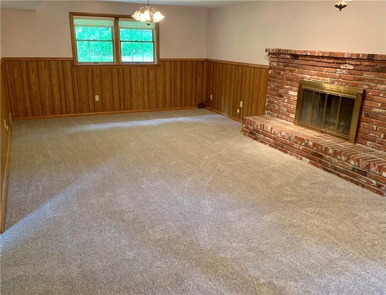 2108 Beulah Road Pittsburgh, PA 15235 - Photo 6 of 25 Large windows bookend both sides of this well lit beautiful family room!