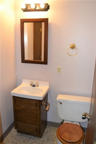 2108 Beulah Road Pittsburgh, PA 15235 - Photo 8 of 25 LOWER LEVEL: Powder room, just off of the family room