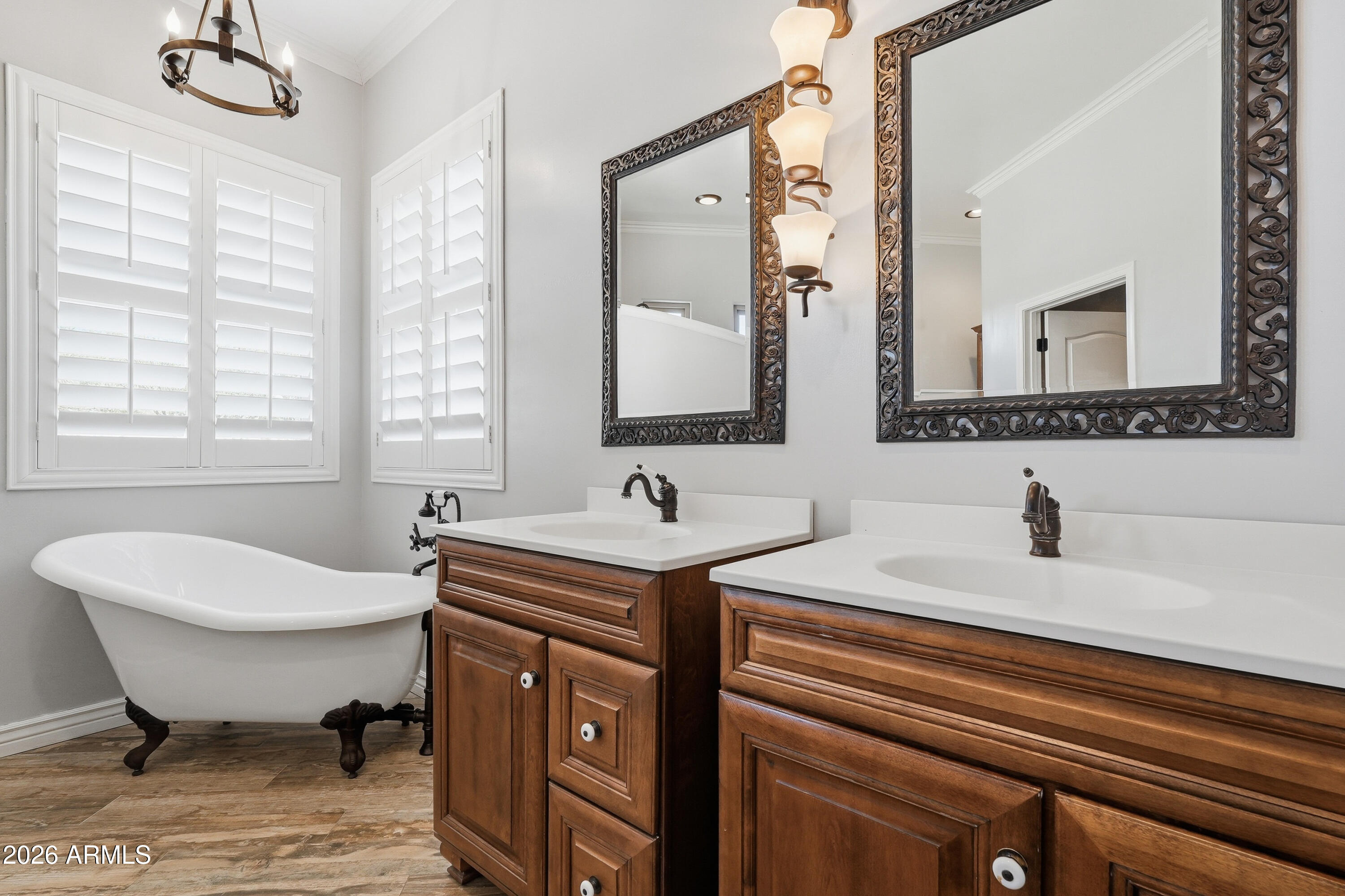 2616 West Canyon Road Phoenix, AZ 85086 - Photo 19 of 45 a bathroom with a sink and a mirror