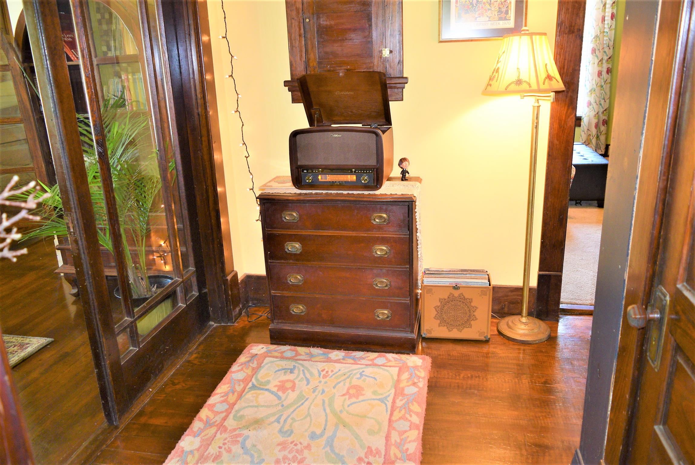 425 Spring Street Guthrie, KY 42234 - Photo 11 of 30 a bedroom with a bed and wooden floor