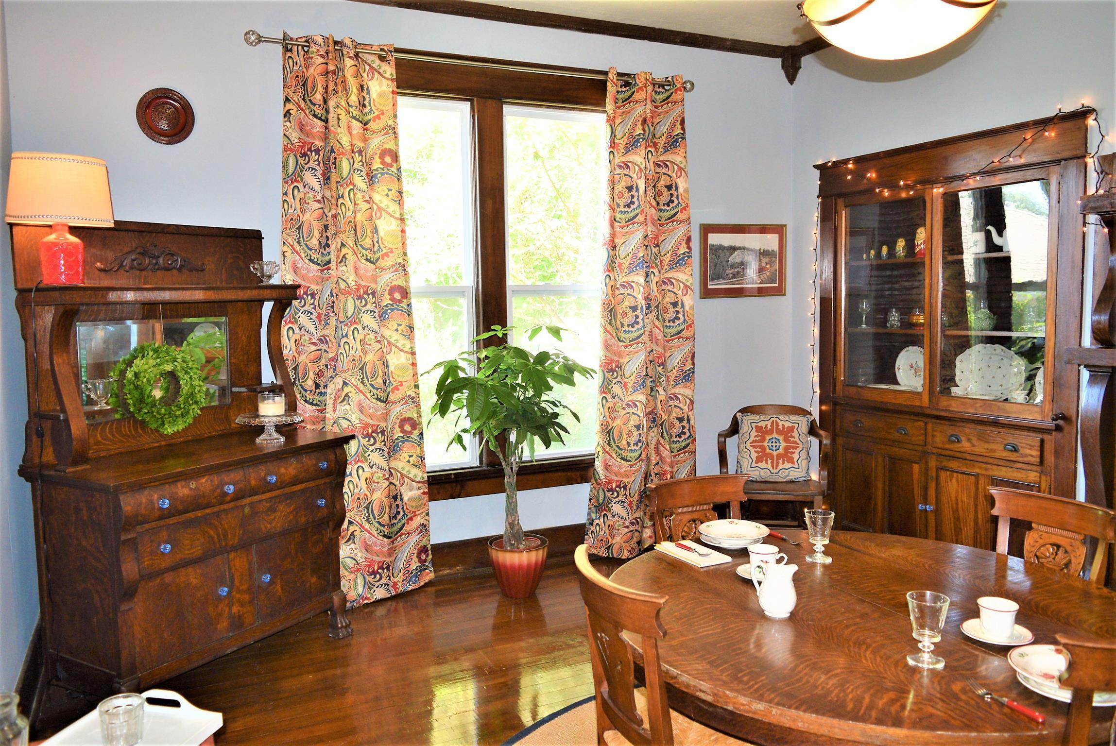 425 Spring Street Guthrie, KY 42234 - Photo 12 of 30 a living room with furniture and a flat screen tv