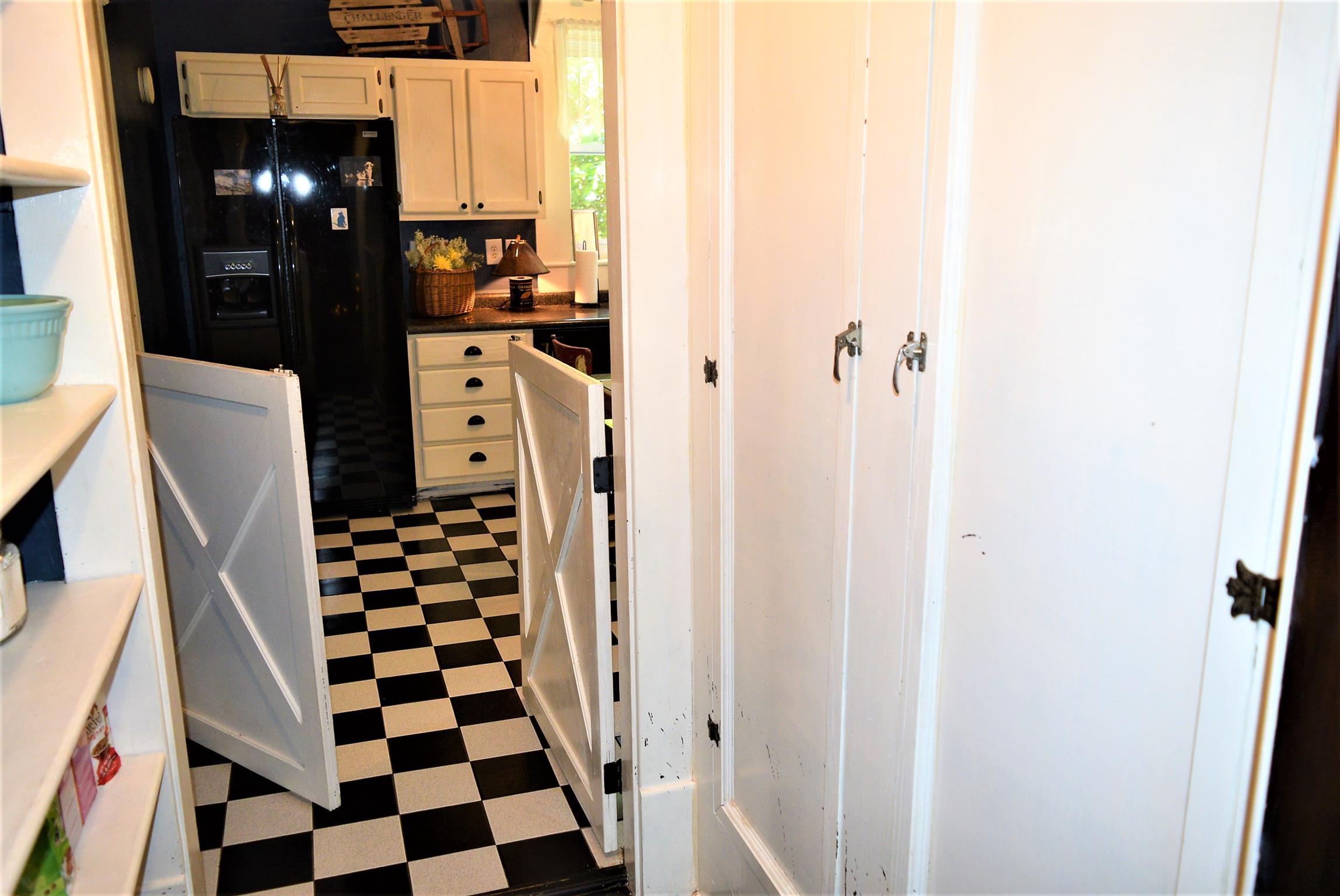425 Spring Street Guthrie, KY 42234 - Photo 14 of 30 a view of a bathroom with a sink and mirror