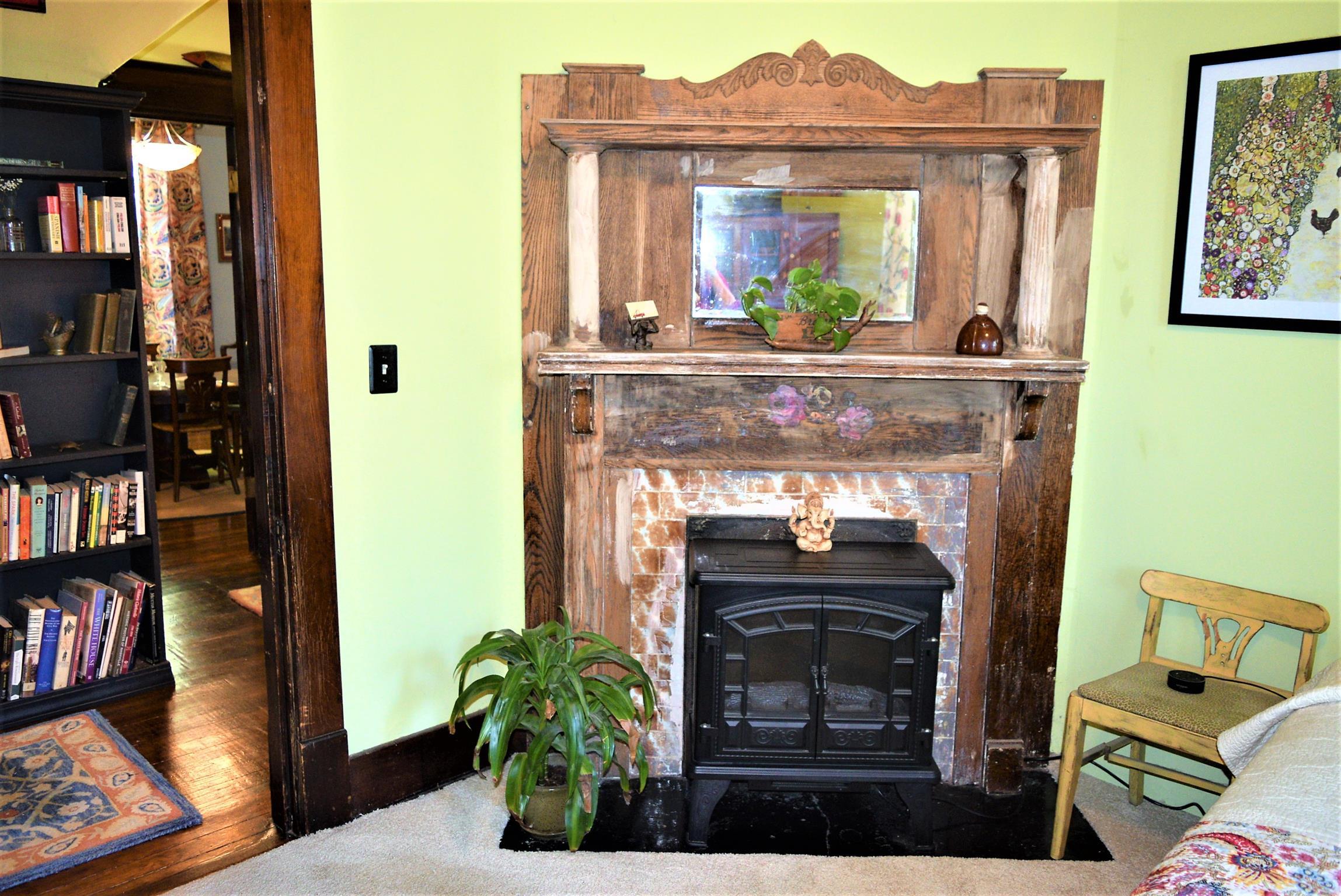 425 Spring Street Guthrie, KY 42234 - Photo 23 of 30 a living room with furniture and a fireplace