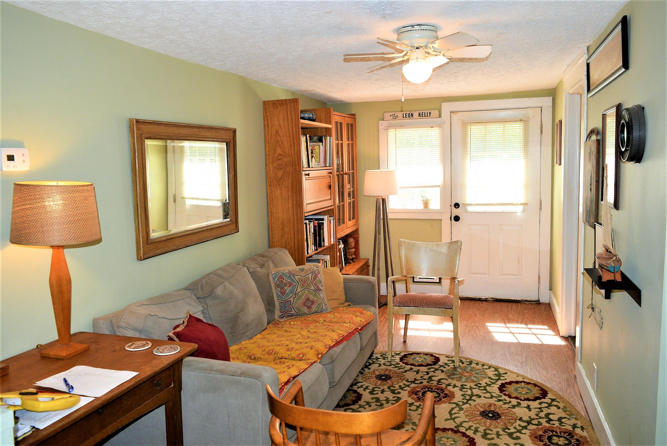 425 Spring Street Guthrie, KY 42234 - Photo 25 of 30 a living room with furniture and a window