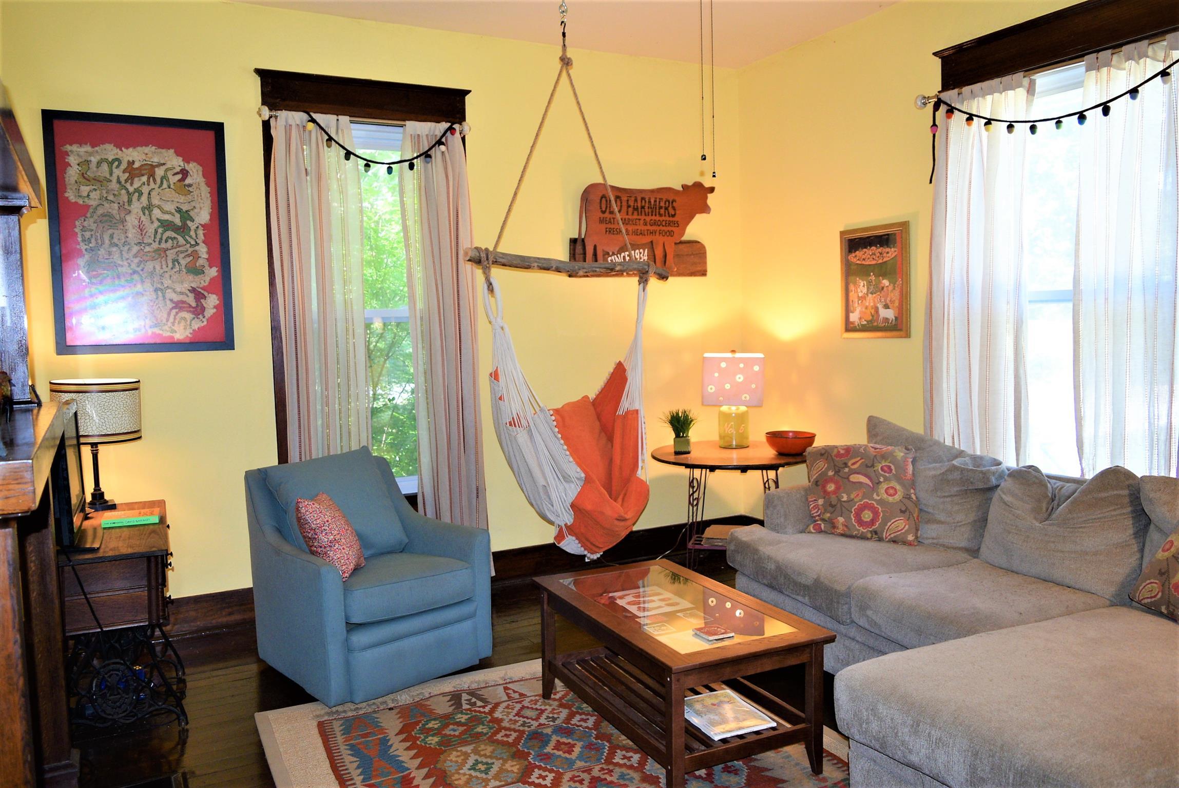 425 Spring Street Guthrie, KY 42234 - Photo 6 of 30 a living room with furniture a rug and a window
