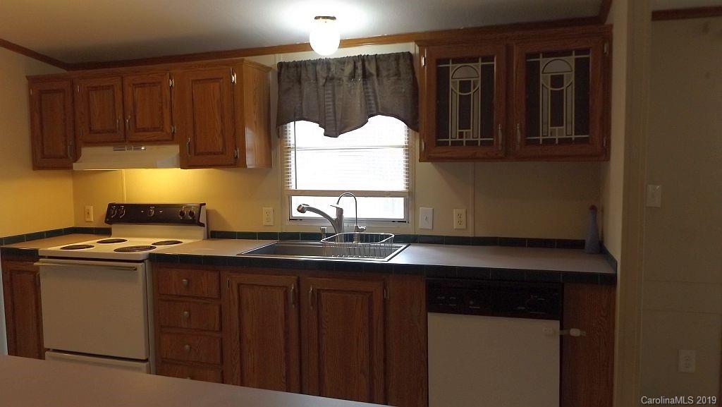 1587 Rhyne Road, Unit 36 Clover, SC 29710 - Photo 14 of 20 a kitchen with a sink and cabinets