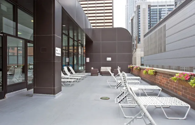 a bathroom with a sink mirror and tub