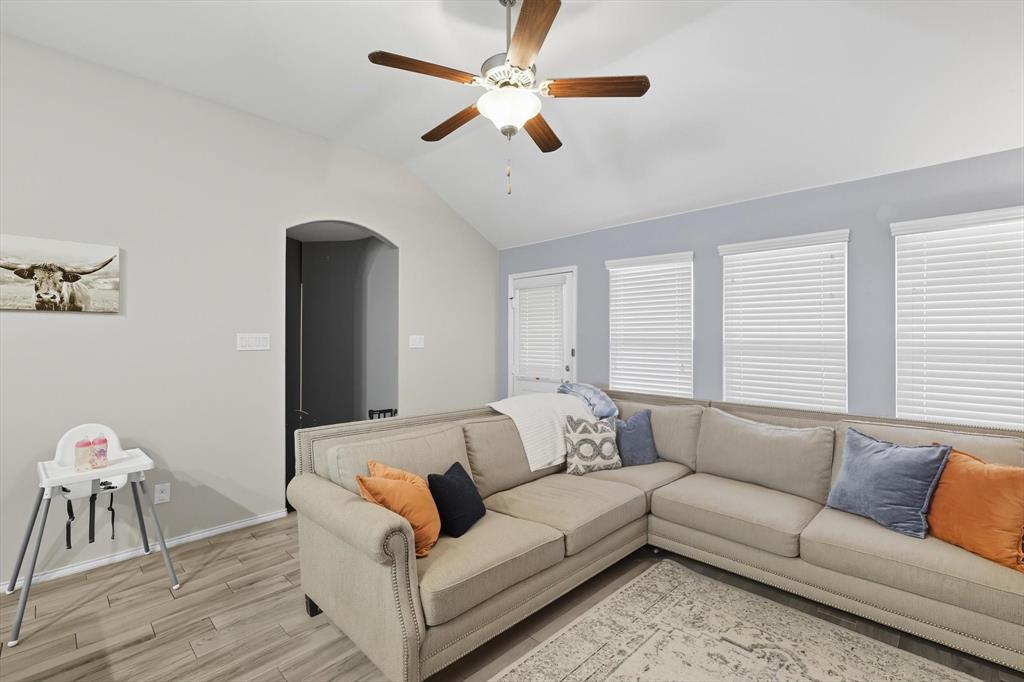 14564 Serrano Ridge Road Fort Worth, TX 76052 - Photo 12 of 29 a living room with furniture and a large window