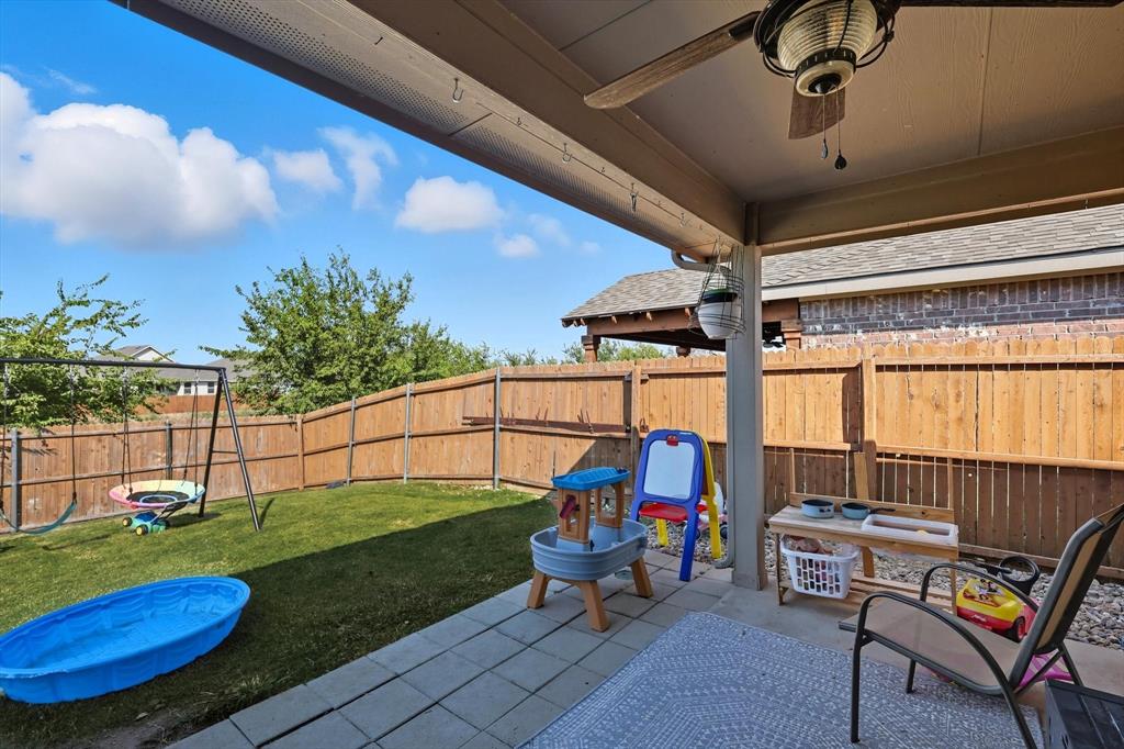 14564 Serrano Ridge Road Fort Worth, TX 76052 - Photo 21 of 29 a view of a porch with furniture