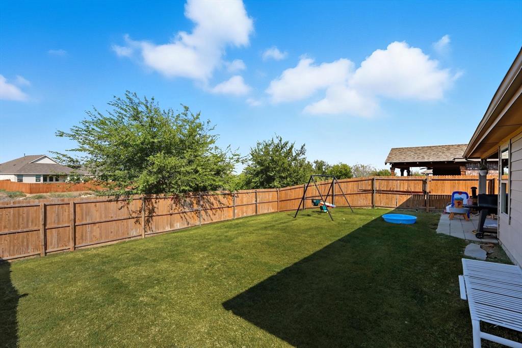 14564 Serrano Ridge Road Fort Worth, TX 76052 - Photo 24 of 29 a view of a backyard