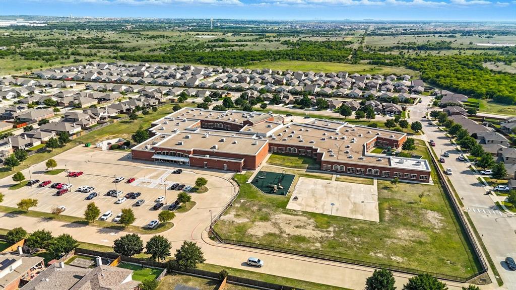 14564 Serrano Ridge Road Fort Worth, TX 76052 - Photo 27 of 29 an aerial view of residential houses with outdoor space