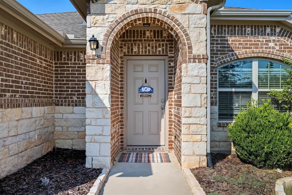 14564 Serrano Ridge Road Fort Worth, TX 76052 - Photo 4 of 29 a view of entryway with a door