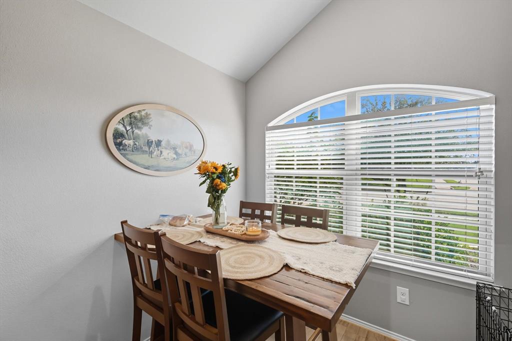 14564 Serrano Ridge Road Fort Worth, TX 76052 - Photo 6 of 29 a view of a dining room with furniture and window