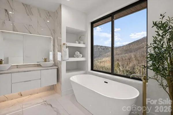 a bathroom with a bathtub and sink