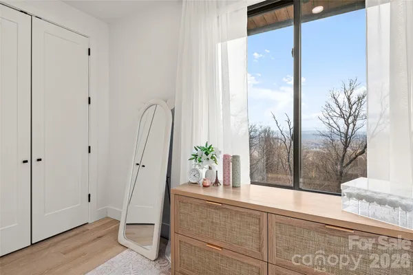 a view of bathroom with a potted plant