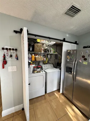 $353,000 | 7005 Northwest 173rd Drive, Unit 1702, Hialeah, FL 33015