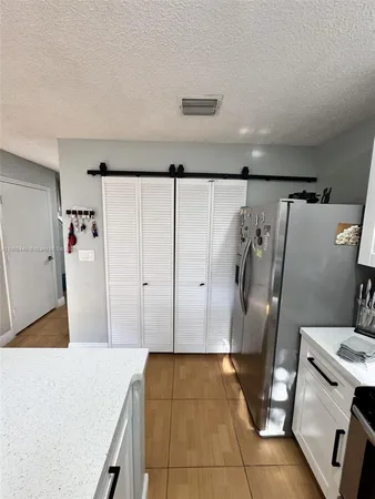 $353,000 | 7005 Northwest 173rd Drive, Unit 1702, Hialeah, FL 33015