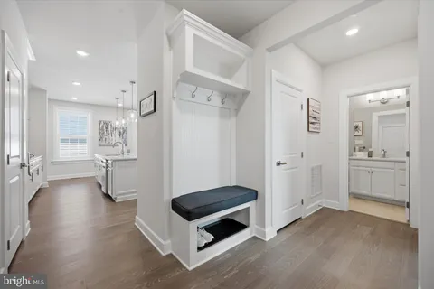 a bathroom with a toilet a sink and shower