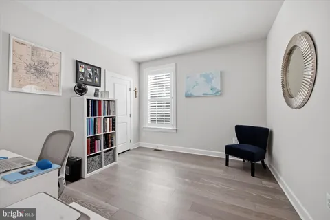 a utility room with sink dryer and washer